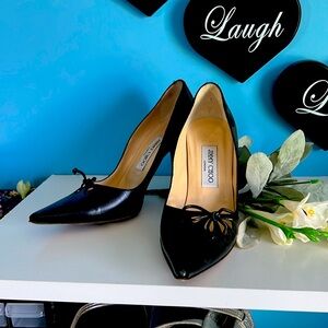 Jimmy Choo 3 1/2 inch stiletto black bow pumps. Size 37 1/2/. 7 1/2.US